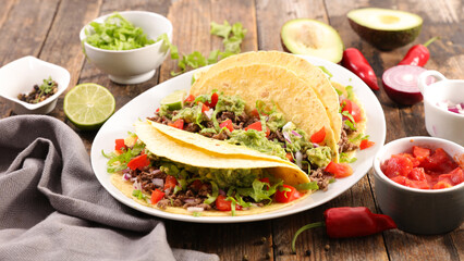 tortillas with beef, avocado, tomatoand spices