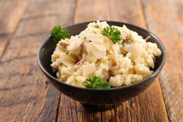 bowl of risotto with mushroom and parmesan