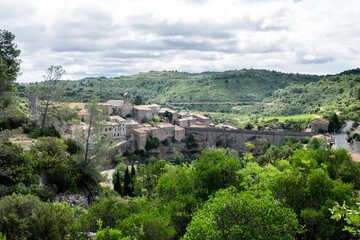 Fototapeta na wymiar The beautiful panoramic cityscape of Minerve, the most beautiful medieval village of France, located in the picturesque mountain valley in Pyrenees