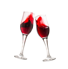 Two wine glasses with vine splashes isolated on white.