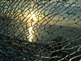 broken glass at sunset. background