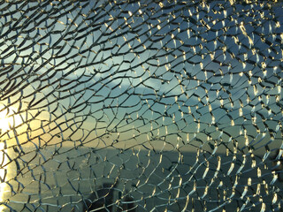 broken glass at sunset. background