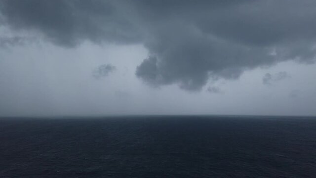 Stormy clouds over dark ocean ready for raining
