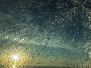 broken glass at sunset. background