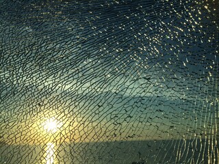 broken glass at sunset. background
