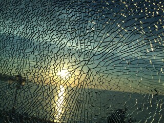 broken glass at sunset. background