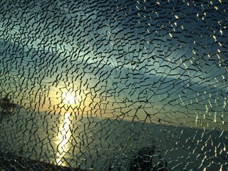 broken glass at sunset. background