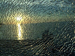 broken glass at sunset. background