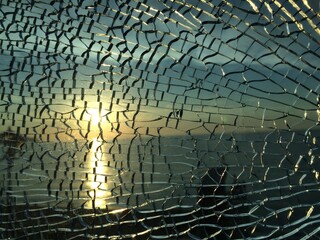 broken glass at sunset. background