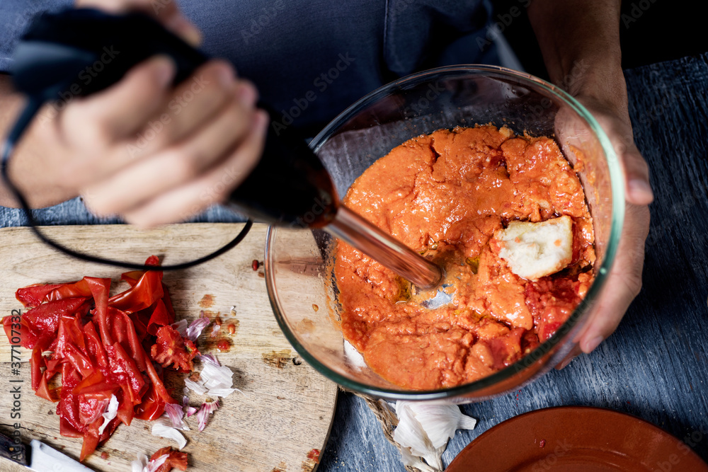 Poster preparing porra antequerana, a cold tomato soup