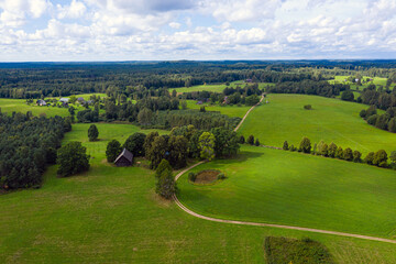 Fototapeta na wymiar idyllic Latvian rural landscape near Cesis, in the territory of the Gauja National Park, view from above