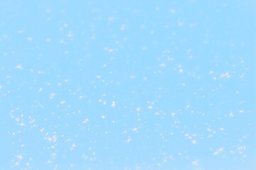 Fototapeta premium Light blue background with dots pattern, spotted background