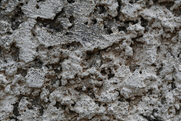 Peeling paint of white wall.Closeup of peeling painted wall.Grungy cracked white wall paint peeling off.