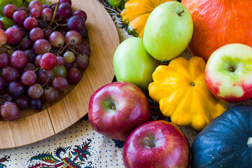 Autumn and fall harvest, pumpkin, apple, grape and pattison