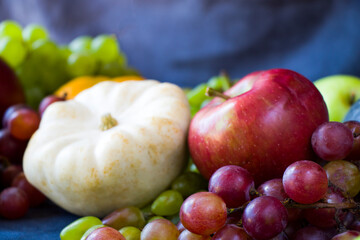 Autumn and fall harvest, pumpkin, apple, grape and pattison