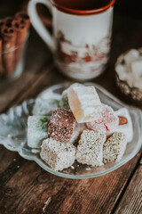 Turkish Delight - a gelatinous sweet confection traditionally made of syrup and cornflour, dusted with icing sugar. Still life food - oriental sweet rahat lokum . Candy marshmallow.