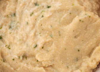 Closeup on hummus sauce texture pattern