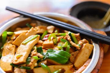 fast food of fried dried tofu slices with soup