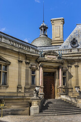 Architectural fragments of famous Chateau de Chantilly (Chantilly Castle, 1560) - a historic chateau located in town of Chantilly, Oise, Picardie, France.