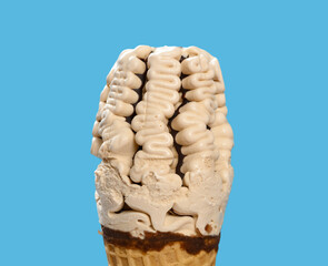 fresh milk tea flavor ice cream cone on a blue background square composition close up