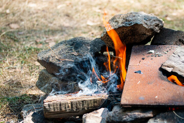 wood-fired bonfire for cooking on a hike