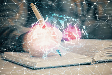 Multi exposure of woman's writing hand on background with brain hologram. Concept of brainstorming.