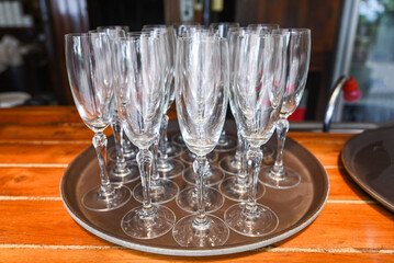 Champagne glass stand on the table - Empty glass of champagne or Wine glass