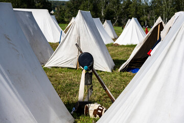 field soldier camp with guns and household items 1812