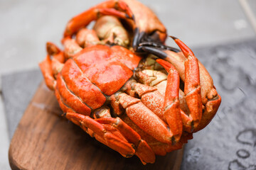 Fresh crab on wooden board for making cooked food - Seafood shellfish Steamed red crab or Boiled stone crab