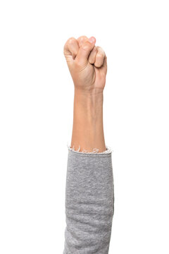 child's hand with fingers in fist
