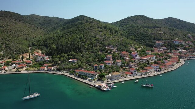 Aerial drone video of picturesque village capital and port of Ithaki or Ithaca island called Vathi a safe anchoring for sailboats, Ionian, Greece
