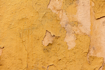 Background of old yellow painted wall