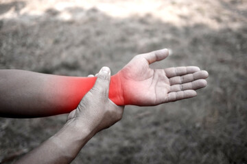 Man holding his hand and body - pain concept