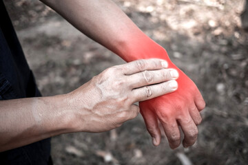 Man holding his hand and body - pain concept