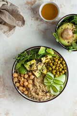 Healthy vegetable lunch from the Buddha bowl with quinoa, avocado, chickpeas. healthy food dish for vegetarians.