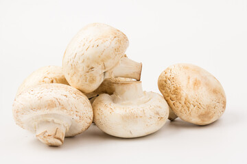 Fresh Champignon mushroom, isolated on white background. Close-up