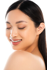 Obraz premium Portrait of young excited asian woman with closed eyes isolated on white