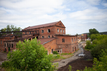 Fototapeta na wymiar The old plant of copper ore processing plant, built in the times of Demidov in Sysert', Russia