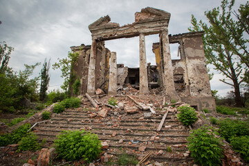 Fototapeta na wymiar Broken house after shelling. War in Donbass. Eastern Ukraine.