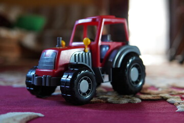 toy tractor on the beach