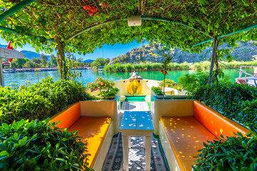 The boat  decorated with flower and plants in Dalyan Town of Turkey