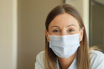 Portrait of european woman with face protection mask