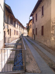 Gaggiano, narrow cobbled alleys of a medieval Italian village