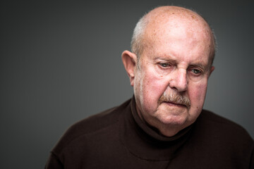 Senior man lonely at home, anxious/afraid to go out - self isolation/ quarantine due to COVID-19/...