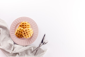 Traditional belgian waffles on white table background top view mockup
