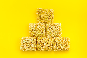 Instant noodle on Yellow background top view copy space mockup