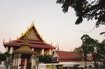 Fototapeta premium Southeast Asia Thailand golden sunset temple traditional architecture travelling scenery