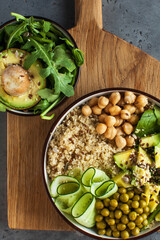 Healthy vegetable lunch from the Buddha bowl with quinoa, avocado, chickpeas. healthy food dish for vegetarians.