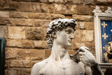 Closeup of Statue of the David by Michelangelo Buonarroti, masterpiece of Renaissance sculpture in Piazza della Signoria, Florence downtown, Tuscany, Italy, Europe