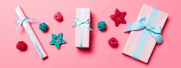 Top view Banner of Christmas decorations on pink background. New Year holiday concept with copy space